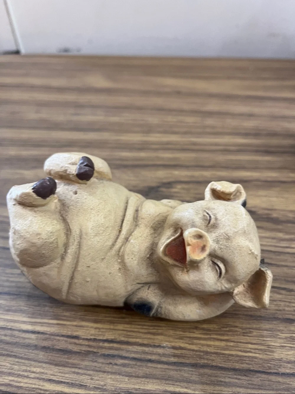 Set of three frolicking pigs